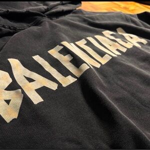 Balenciaga Black Hoodie with Distressed Cream Logo